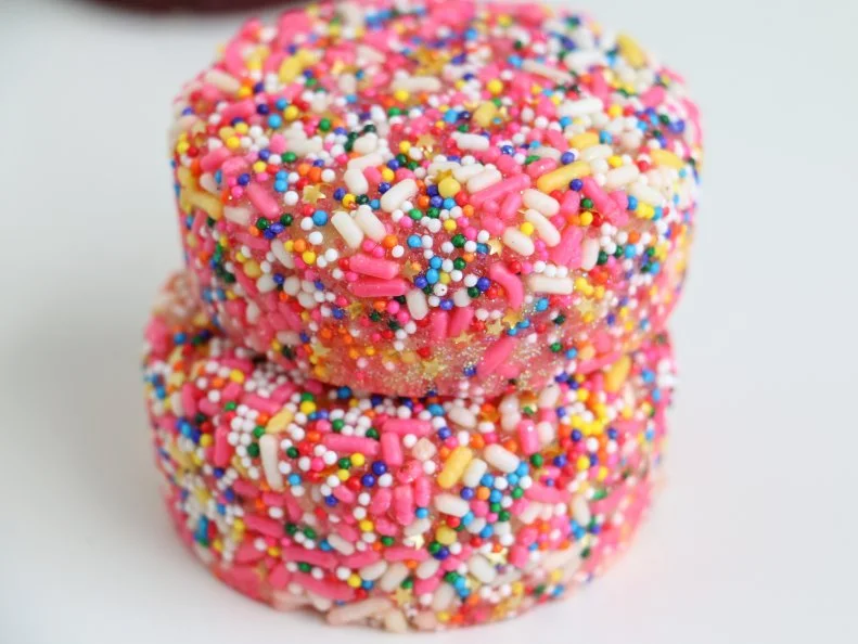 Margo Wolfe was simply experimenting at home when she decided to stuff cookie dough with other sweets (think brownies and caramel candies). Dubbed “doughies,” the gooey cups became an Instagram sensation, leading to her full-time baking operation, MdoughW. Even with many rotating flavors available, this sparkly variety — covered in sanding sugar, sprinkles, nonpareils, gold stars and edible glitter — is still a fan favorite.