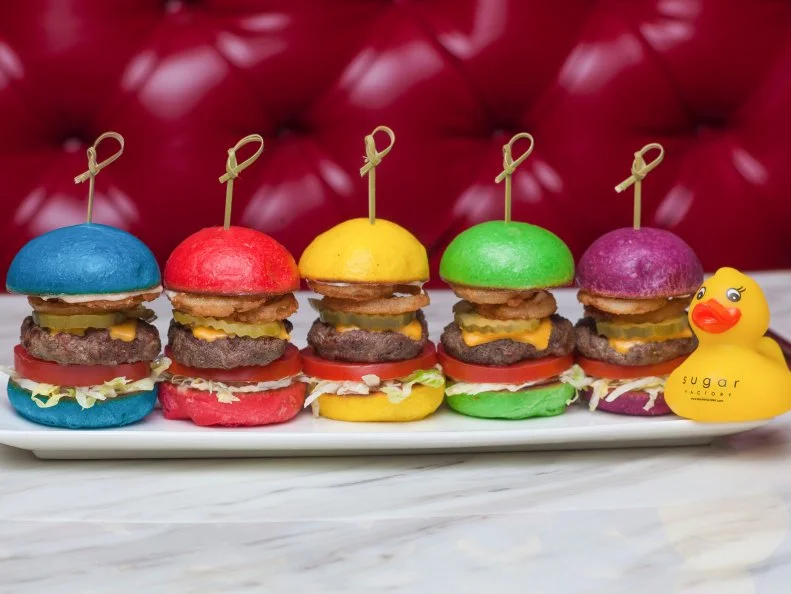 Everything at this celeb-approved hotspot is as fun to look at as it is to eat, including goblets of candy-studded cocktails and the eye-catching rainbow sliders. Each tiny burger comes in a different-colored brioche bun, but all hold fillings of a mini angus beef patty, pickles, American cheese, onion rings and Sugar Factoryâ  s special sauce.