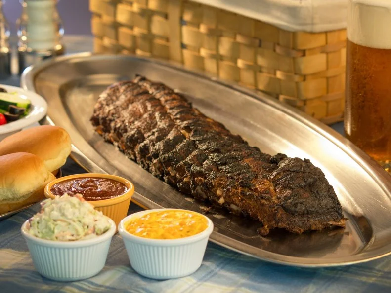 After relocating from their hometown of Kansas City, Missouri, to Longmont, Colorado, in 1989, Merry Ann and Tracy Webb were in desperate need of some ’cue. With only grim offerings available, they decided to take matters into their own hands, opening The Rib House on July 5, 2001. Good thing they did: The place has since won an array of best-barbecue awards from print outlets such as Sunset magazine and the Longmont Times-Call and been featured in TV spots on Travel Channel and Discovery Channel. The Webbs are best known for their hickory-smoked baby back ribs, but they also offer other Kansas City specialties, such as beef ribs, pork, brisket, turkey and smoked ham.
