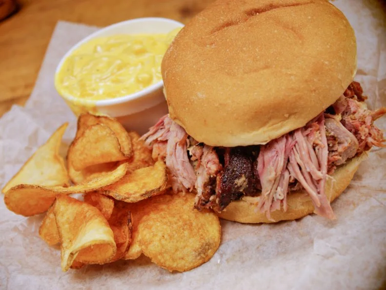 Smokey D’s is like the Meryl Streep of competitive barbecue. If husband-and-wife team Darren and Sherry Warth show up at a competition, there’s a good chance they’ll be leaving with at least some kind of nod, if not a trophy. The couple compete most weeks and have won more than 75 state BBQ championships and more than 800 local, regional and national awards. The Warths also run three Iowa restaurants where guest can sample their goods such as chopped pork, pulled chicken, sliced turkey and pit ham. Locals adore the Kansas City-style burnt ends. On his visit for Diners, Drive-Ins and Dives, Guy Fieri went nuts over the smoked chicken wings, which are served naked or coated with your choice of BBQ, Asian glaze or Buffalo sauce.