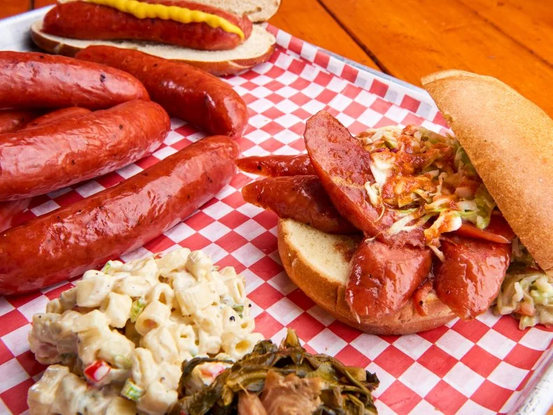 What started as a slaughterhouse and meat market back in 1954 has since morphed into one of Vegas’ top meat markets and barbecue restaurants. Third-generation owner Chuck Frommer opened the Road Kill Grill, where his crew slow-cook high-quality meats for up to 16 hours. Frommer encases each cut in his own blend of seasonings, including specific varieties of peppers that he roasts for an entire day before grinding into powders. This attention to detail is why many locals say Road Kill Grill has the best hot links and rib tips in the state of Nevada.