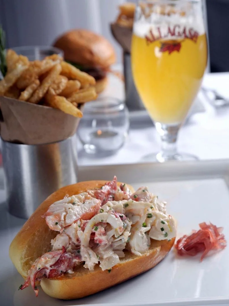 The battle for lobster roll supremacy in Boston may be stressful for restaurateurs, but it’s a delicious research project for diners. Variables include the type of roll, whether the lobster meat is hot or cold, and if it’s served with mayonnaise or not. For the purist, Mare in the North End offers a top-notch version, made with the meat of a two-and-a-half-pound lobster and nothing else, served in a brioche roll made fresh daily at its sister bread bakery, Bricco Panetteria. Snag a seat on the patio for great views, cozy fire pits and a glass of wine to enhance enjoyment of your lobster roll.