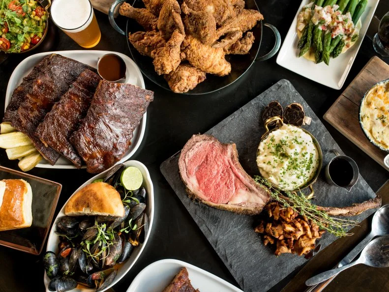 Atlanta’s new Mercedes-Benz Stadium (already dubbed “The Benz”) has a starring attraction other than the NFL and pro-soccer games and concerts it hosts. One of its culinary stars, not just for game days, is Molly B’s. The sprawling 3,000-square-foot restaurant and bar has sweeping views of downtown and the field and is named for Atlanta Falcons owner and chairman Arthur Blank’s mother, Molly. Under the deft hand of Executive Chef Michael Bertozzi, the menu comes to life with a juicy prime rib carving station, sustainably sourced crudo and raw bars and a la carte offerings including Southern fried chicken, white cheddar mac ‘n’ cheese and baby back ribs. The restaurant operates as a private club for members for three hours before kickoff through the end of the first period, but is open to non-members for the remainder of the game days and throughout the week. 