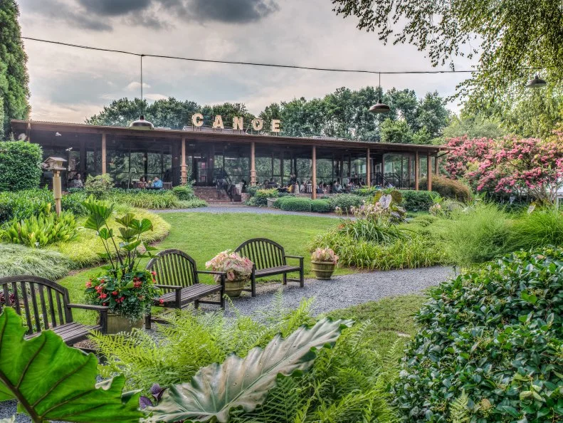 For festive meals and special occasions, few Atlanta restaurants feel as special as Canoe, thanks to its classic fine dining menu and riverside position on the banks of the Chattahoochee River. Opened in 1995, it’s been a go-to spot for proposals, family celebrations, business meals and leisurely, sun-soaked meals. Executive Chef Matthew Basford’s seasonal menu is easy to love, including tea-smoked Georgia white shrimp and daikon radish salad, house-smoked salmon on a crispy potato cake, duck ‘n beef burger topped with a sunny-side-up egg, and oven-roasted chicken over sweet potato-brown butter risotto. Sit inside for sweeping river views or outside where you’ll be close enough to hear the gently flowing current.