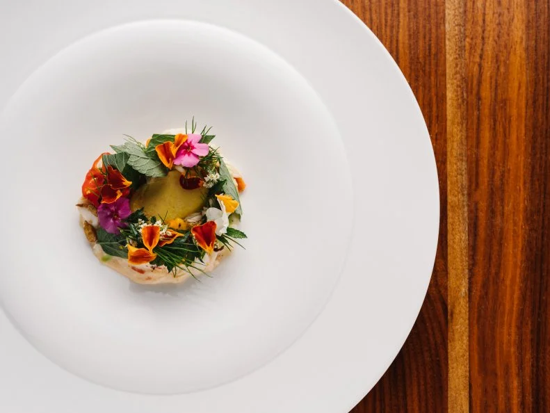 The story behind the inception of this acclaimed restaurant is nearly as compelling as its food. It started as a dream of Chef Ryan Hidinger and his wife, Jen. Sadly, Hidinger lost his battle with cancer in 2014, but Jen, along with Ryan’s sister Kara and his dear friend Chef Ryan Smith, carried out the vision, opening Staplehouse to rave reviews. Smith’s thoughtful style of cooking is at once experimental, envelope-pushing and creative, the ever-changing menu peppered with dishes like chicken liver tart with strawberry and radish, or monkfish with lemon and ginger dressing. Profits from the nearly impossible-to-get reservations go to The Giving Kitchen, a nonprofit started by the Hidingers to offer support to Atlanta-area restaurant workers facing unexpected hardships.  