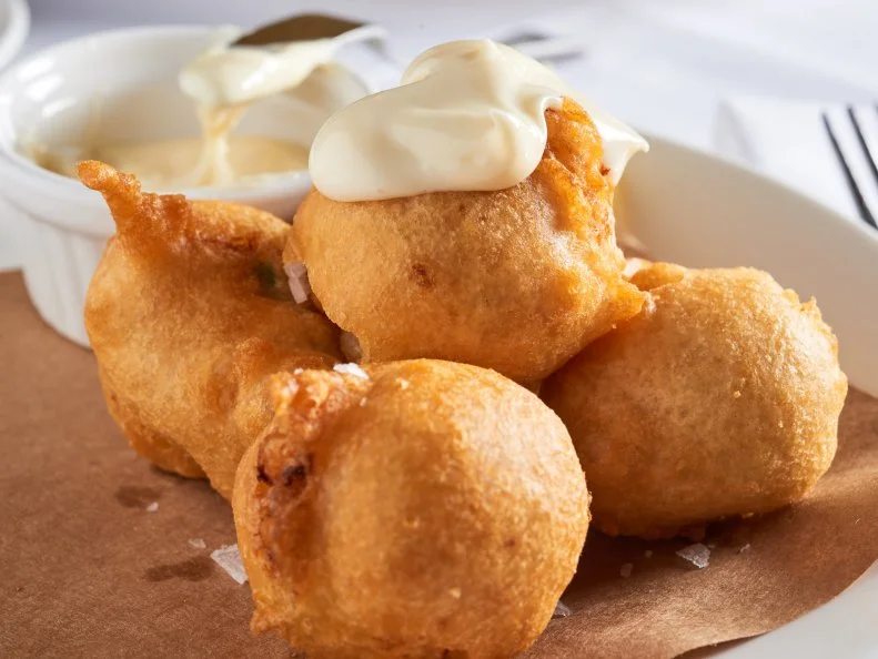 It’s a joke at La Petite Grocery that every table orders crab beignets; some tables even do so before they order their drinks — they’re that good. Craggy and delicate and served with malt aioli, they’re a sublime entry to the world of Justin Devillier’s cooking. From there, choose your own path. The turtle Bolognese comes topped with a fried, soft-boiled egg; the fish mains are always solid; and the burger is legendary.