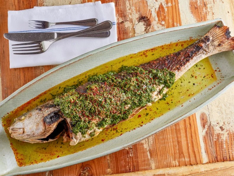 There may be no more reliable, perfect place to eat seafood in New Orleans than Pêche. The sourcing comes from local waters — to the extent that we’ve heard that the restaurant has its own battery of fishermen in the Gulf of Mexico. Order raw oysters, yes. But also order shrimp toast, wood-oven–grilled whole fish with salsa verde and all the side dishes, but especially the white beans with bacon and Brabant potatoes. One sleeper hit: the smothered catfish. It’s a dish that tastes deep and true, like the homey flatlands of Cajun Louisiana. 
