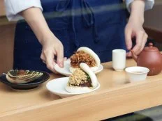 Granted, these are not London's best bao, nor the city's cheapest (hello, Chinatown); however, a healthy two years after opening, Bao continues to draw the crowds that have flocked here since day dot, thanks to its bonkers tasty offerings and central-Soho locay. Its eponymous headline act, gua bao, is a pretty good use of £3.75: Pick from classic confit pork (described as "exquisimendous" by a trusted source), fried chicken, lamb shoulder, daikon and fried Horlick's ice-cream (yezzir!). That's not the only startling entry on the menu: The intriguing Taiwanese dishes to try include pig-blood cake, beef soup, peanut milk (say whaaat?) and trotter nuggets. The dining space is as small and simple as the headline act, so come early and be prepared to get in line.