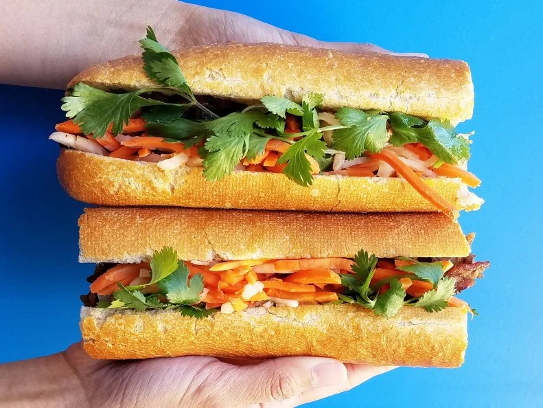This portable bargain bite comes from Nong Lá Vietnamese Cafe, a popular family-owned Vietnamese outfit with two locations in Los Angeles. For $7, the banh mi gets stacked with a meat — including grilled pork, steak or chicken — with mayo, picked carrots and daikon, cilantro, and jalapeno, all on a warm eight-inch French baguette. For $1.50 extra, customers get a full foot-long sandwich. 