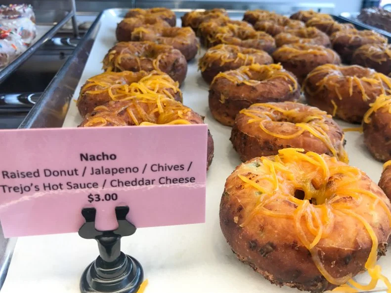 Danny Trejo is one of the most-beloved names in Hollywood, thanks to his iconic mustache and knack for playing the bad guy, but he also does something else magical in Los Angeles that has nothing to do with the big screen: make doughnuts. At Trejo’s Coffee and Donuts — Trejo’s new addition to his growing restaurant empire — you’ll find some of the city’s most-interesting  and tasty  doughnuts. One winner is the Nacho Raised Donut ($3), with jalapeño, chives, Trejo’s hot sauce and melted cheddar cheese.