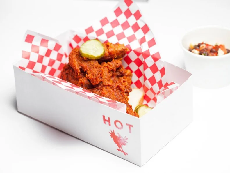Itâ  s not the easiest task to get a meal at Howlinâ   Rays. The ever-present line is a formidable foe, and can deter casual visitors from the Far East Plaza staple. But the chicken is well worth the wait. Between the sweet and fiery flavors and the perfect, densely crunchy texture, it could be the best fried chicken outside of Nashville. At $9, the Quarter Bird presents a massive hunk of golden-skinned chicken (either a breast and wing, or a leg and thigh) on a slice of white bread to soak up the spicy juices. The pickles on the side add refreshing, briny freshness between bites.