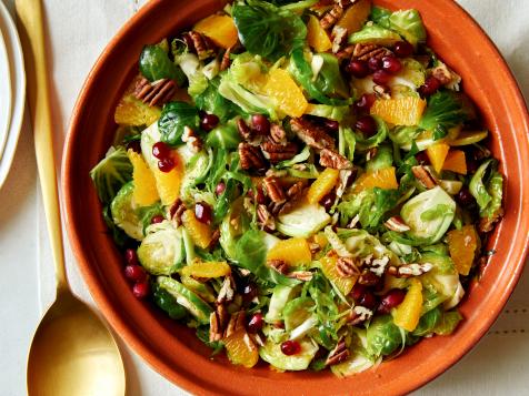 Shaved Brussels Sprouts with Pomegranate Orange Vinaigrette and Pecans