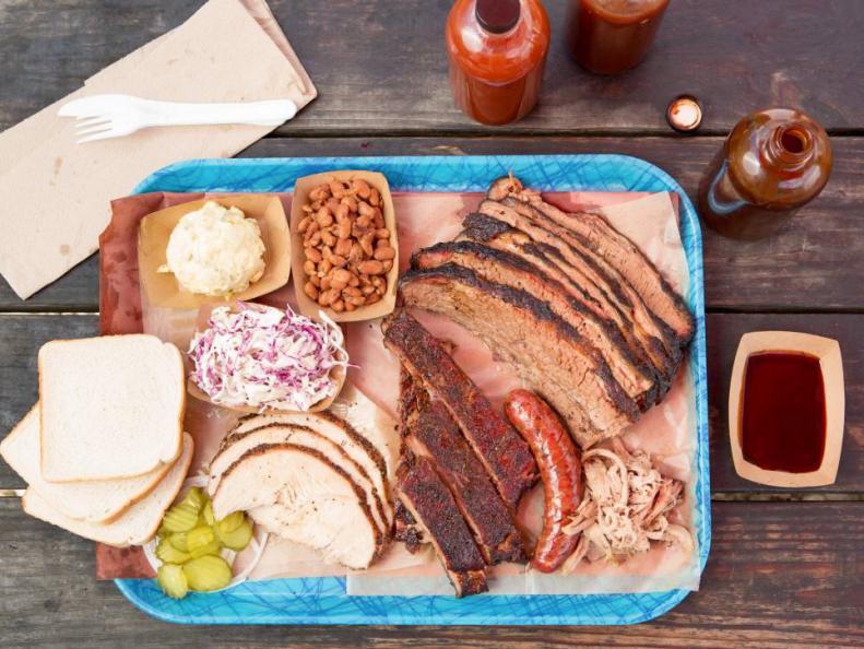 For brisket snobs, trips to iconic Texas barbecue joints are like pilgrimages. There's a wealth of legendary places to visit within a short drive of the city, but the most-beloved of them all is located right on 11th Street just a block east of downtown. Franklin's worldwide reputation for the best bite of brisket in the universe draws staggering crowds, such that a line forms at sunrise. There's no dodging the queue (unless you're Obama), so be prepared to spend a few hours in the sun teased by wafts of post oak smoke coming from their hulking metal smokers. Those hours disappear though once you've reached the front of the line, where their meat cutters slice off a sample bite as a reward for your patience before the real meat nirvana begins. Pro-tip: They do accept bulk pre-orders, but they need to be made at least a month in advance.