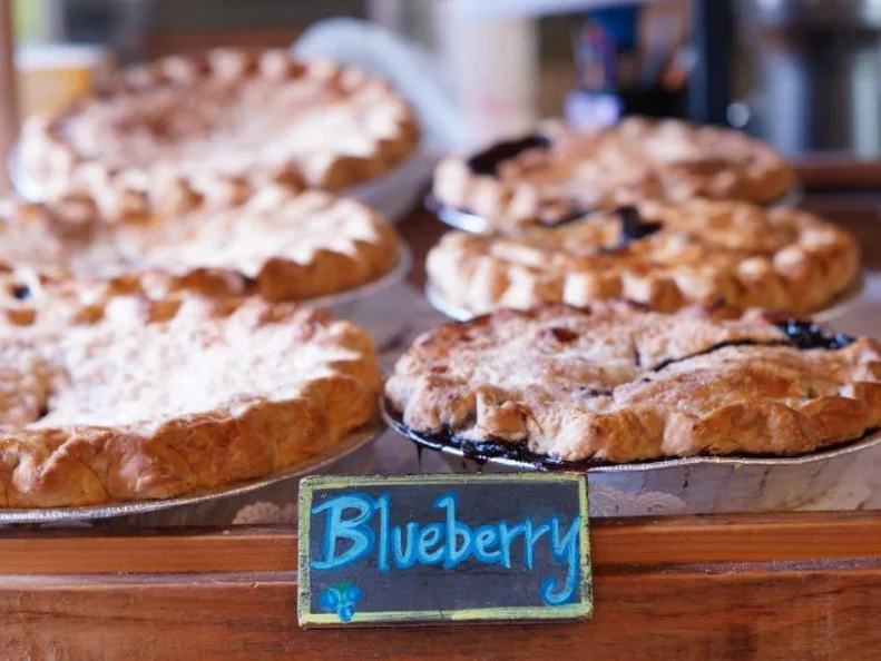 Maine blueberries are different from the version found on supermarket shelves and in your pancakes: The flavor is more tart and each berry is more compact. Try the at their best in a pie from Two Fat Cats, where theyâ  re cut with a little bit of sugar and some secret spices.