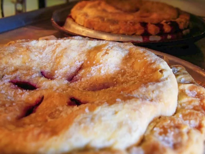 Minnesota has long fostered a local love of pie. Bakers pride themselves on preparing blue ribbon-fetching rounds at state fairs, and the fastest pies to be devoured at potlucks. Pies abound at restaurants and bakeries, including at New Scenic CafÃ© on Minnesota's North Shore, where local berries, pumpkin and other produce fill the buttery, flaky crusts for slices topped with whipped cream or buttermilk-vanilla ice cream.