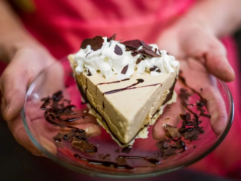 Wisdom, a spit of a town in the heart of Montana’s Big Hole Valley, is home to The Crossing Bar & Grill at Fetty's and some of the best pie under The Big Sky. Clad in a crisp, pink vintage apron, Diane Havig — who owns the business with her husband, Dennis — greets customers with a rolling pin as she perfects crusts on lattice-topped apple pies, huckleberry-blueberry pies, rhubarb, chocolate-bottom peanut butter and other pies — so many, in fact, that the dining room chalkboard barely squeezes in the list.