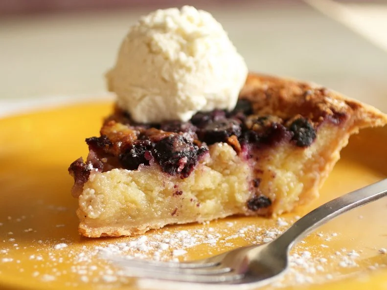 A summery spin on classic Southern buttermilk pies, baker Keeley Steel’s blueberry-studded pie balances the classic tang with bright berries. It’s excellent with ice cream and a mug of coffee.
