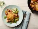 Food Network Kitchen’s Lemon-Garlic Skillet Chicken and Potatoes, as seen on Food Network.