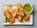 Food Network Kitchen’s Whole30 Coconut-Crusted Shrimp with Pineapple-Chili Sauce, as seen on Food Network.