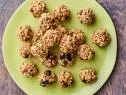 Description: Ree Drummond's No-Bake Cookies. Keywords: Granola, Rice Krispies Cereal, Golden Raisins, Dried Cherries, Pecans, Pistachios, Crunchy Peanut Butter, Vanilla.