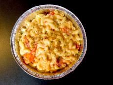 <p>The lobster here is extra fresh especially because the water for the aquariums is pumped directly from the ocean. The lobster mac 'n' cheese Guy called "ridiculous," while the cod cakes tasted like the "perfect storm." Locals like the crab and other seafood-inspired dishes as well.</p>