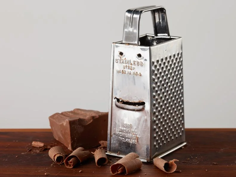Food Network Kitchen’s Grating Chocolate for Food Network's 14 Reasons to Love Your Box Grater, as seen on Food Network.