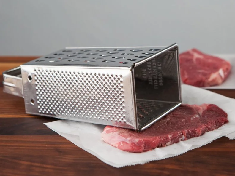 Food Network Kitchen’s Tenderizing Meat for Food Network's 14 Reasons to Love Your Box Grater, as seen on Food Network.