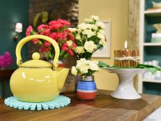 Jeff Mauro makes a Cheese Shaker Vase, Katie Lee makes a Cinnamon Stick Candle, and Sunny Anderson makes a Clothespin Trivet, as seen on Food Network's The Kitchen