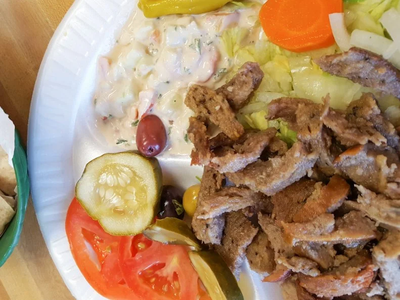 Located just a few miles from downtown, the Pita House is a localsâ   favorite that serves up lots of traditional Middle Eastern fare at a bargain. Lines can stretch out the door as customers wait to order at the counter. The menu is extensive, and everyone seems to have their favorites, like hummus, falafel and chicken or beef shawarma. But the tasty gyro plate â   seared strips of a seasoned blend of lamb and beef, tasty tahini salad, pickled vegetables, olives and pita â   is a frequent order for good reason (and can also be served as a sandwich). Youâ  ll have a hard time spending more than $10 on anything, and the restaurant and adjoining Middle Eastern market only accept cash.