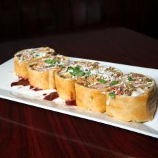 The Cali Baja Roll with Red Chile Braised Duck at Backstreet Grill, as seen on The Grill Dads, Season 1.