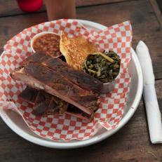 Smoked ribs with beans, greens and cracklin corn bread at B's Cracklin BBQ, as seen on Eat Sleep BBQ, Season 1..