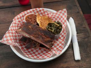 Smoked ribs with beans, greens and cracklin corn bread at B's Cracklin BBQ, as seen on Eat Sleep BBQ, Season 1..