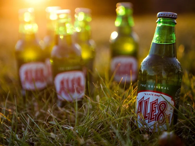 In Winchester in 1926, G. L. Wainscott launched Ale-8-One, a new, gingery, caffeinated soft drink. He promoted it as “A Late One” to spotlight its recent arrival on an active soft drink scene. For decades, fans went to Winchester to buy the drink, carrying supplies to friends and family members far away. Now Ale-8-One is available online and its distribution area includes much of Kentucky, along with some Ohio and Indiana counties. G. L. Wainscott’s great-great-nephew Fielding Rogers heads the company today, and he still relies on the founder’s handwritten notes to stay true to the original recipe.
