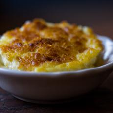 Corn pudding, a side dish of baked, corn-filled custard, delights Kentuckians at large family meals, potlucks and holiday dinners. Many Kentucky home cooks depend on a widely shared recipe that stays on the menu at Beaumont Inn in Harrodsburg, handed down through five generations of the owners’ family. The James Beard Foundation declared the Beaumont Inn an American Classic in 2015, honoring nearly 100 years of family ownership and a commitment to iconic Kentucky foods like country ham and fried chicken.