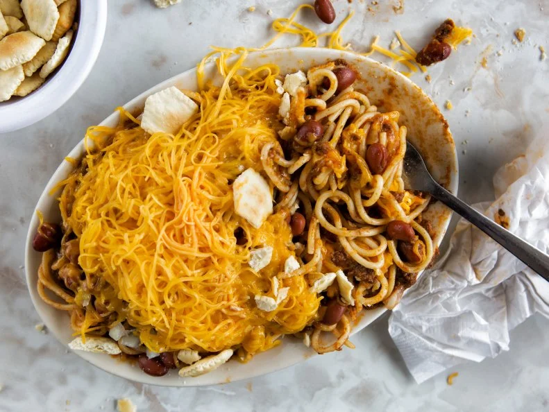 Nicholas Lambrinides, born in Greece, started Skyline Chili in 1949 in Cincinnati, relying on a secret blend of Mediterranean spices. Across the Ohio River, northern Kentuckians have enjoyed their own Skyline locations for decades and claim the flavorful sauce as part of their cuisine. Basic chili, called a “3-way,” comes on a bed of spaghetti, topped with grated cheese. Diners can keep adding toppings, choosing beans or onions or both, to reach a “4-way” or “5-way.” The chain’s signature Coneys are sauce-topped hot dogs, with other toppings optional. There are several Skyline Chili branches in Louisville.