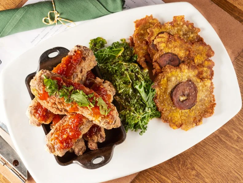 Cane and Table Crsipy Rum Ribs with two sides
Truebridge Duroc Pork Ribs, Guyanese Rum, Papaya Chutney
sides: Skillet Greens, Home-Made Tostones, Mojo Mayo