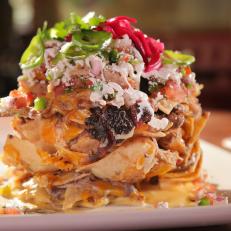 Trash Can Pork Nachos as served at Guy Fieri's Playa Del Carmen Kitchen and Bar in Centro, Playa Del Carmen, Mexico as seen on Food Network's Diners, Drive-Ins and Dives episode 2606.