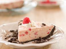 This icebox pie has everything you want in a summer dessert--fresh berries, creamy coolness, and chocolate! It assembles quickly and is a make-ahead, so it's a dream for warm-weather entertaining.