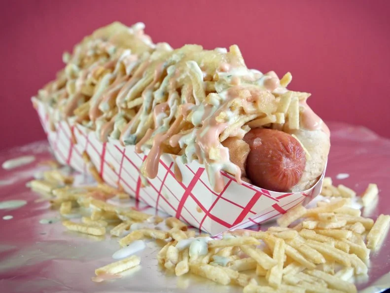 New York and Chicago are known for their hot dogs. Miami, however, has the Perro Caliente, Colombia’s answer to the globally beloved street food. Find it at Mao Colombian Fast Food, where customers come for boiled dogs nestled in soft buns and piled high with Colombia’s favorite condiments, including crushed potato chips, pineapple sauce, mustard, ketchup and pink sauce (a ketchup-mayo hybrid). While those are the usual toppings for these kinds of franks, Mao lets guests customize toppings from a lengthy selection of options (think: sausage, bacon, lettuce).