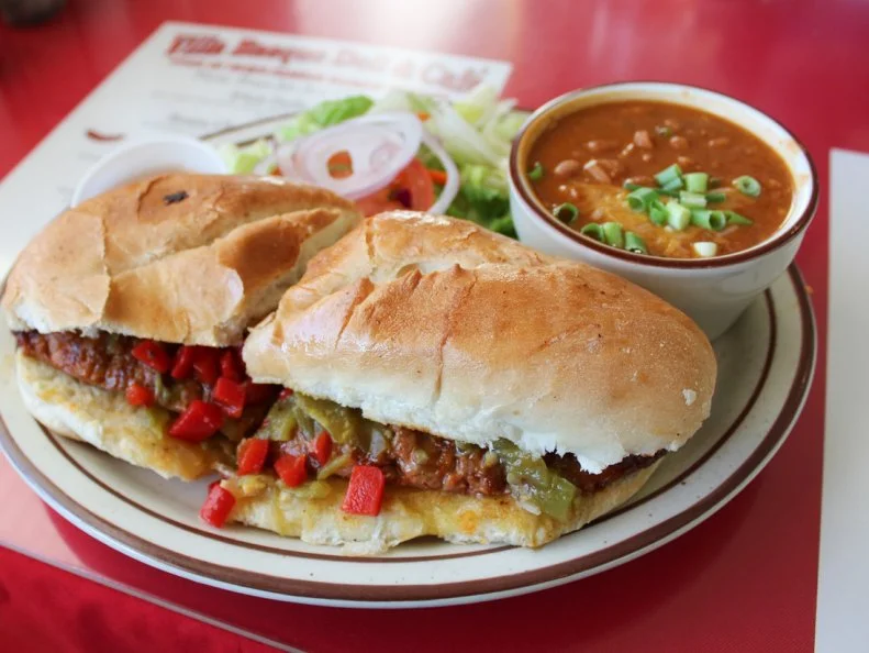 Born on the Spanish side of the Basque homeland, Pete Coscarart started handcrafting chorizo in Battle Mountain in 1984. The delectable air-dried sausage, made of pork shoulder with paprika, garlic and other spices, figures prominently into Villa Basque Café, the restaurant he and his wife, Martha, founded in Carson City in 1997. Grilled, butterflied and served hot, the chorizo shines on a simple sandwich topped with mild Ortega chiles and pimientos on a locally baked French roll.