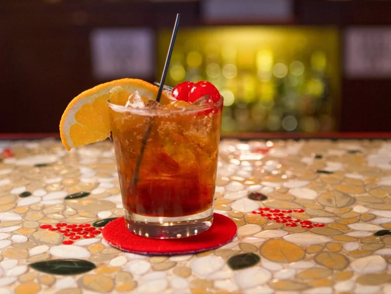 If states had official cocktails, as they do mottos, Wisconsin’s would certainly be the brandy old fashioned. Why brandy and not whiskey, as is customary elsewhere? It could be the penchant for fruit brandies that Germans brought to Wisconsin in the 19th century. It could be marketing: Some say Korbel’s introduction of its brandy in 1893 at the Columbian Expo in Chicago turned the heads of Wisconsin Germans who visited the fair and then spread the word throughout Dairyland. Old Fashioned's go hand in hand with another beloved regional institution, the supper club. At classic places like the Ding-A-Ling, the cocktails are so prevalent as an evening starter that bartenders can practically mix them with their eyes closed.