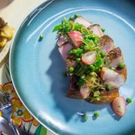 Geoffrey Zakarian makes Pork Chops with Spring Vegetables and Mustard Sauce, as seen on Food Network's The Kitchen