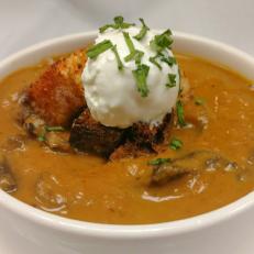 Since the 1980s, this Delaware restaurant and tavern has lured customers from throughout the region. It has several beloved menu items, but few have developed the following of the pumpkin-mushroom soup. Honey adds a touch of sweetness to the pumpkin, but it's balanced by the earthy mushrooms. Each bowl is topped with sour cream, croutons and chives.