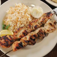 Chicken Kabobs with Garlic Sauce and Hummus as served at Café Lili in Houston, Texas as seen on Food Network's Diners, Drive-Ins and Dives episode 2609.