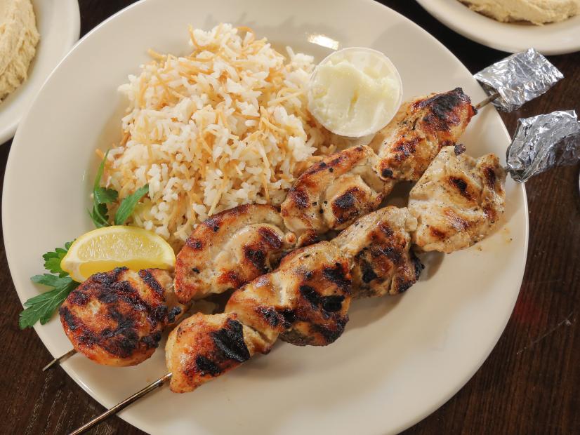 Chicken Kabobs with Garlic Sauce and Hummus as served at Café Lili in Houston, Texas as seen on Food Network's Diners, Drive-Ins and Dives episode 2609.