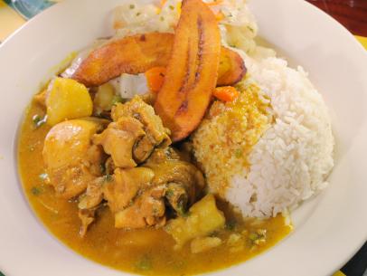 Curry Goat as served at Cool Runnings Jamaican Grill in Houston, Texas as seen on Food Network's Diners, Drive-Ins and Dives episode 2609.