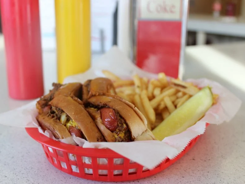 Whether you call them Michigans, Red Hots, Coney Island or Texas dogs, hot dogs topped with a finely ground meat chili, chopped raw onions and yellow mustard are as beloved by Vermonters as if they came from the Green Mountain State. During warm weather, seasonal snack bars like Brigante’s Snack Bar in Colchester and Beansie’s Bus in Burlington are favorites. At Handy’s Lunch — a third-generation Burlington icon in its own right — they call it a Texas dog, and it’s available year-round. The bun is griddled buttery-crisp on the outside, the hot dog snaps under your teeth and the chili recipe is a family secret.