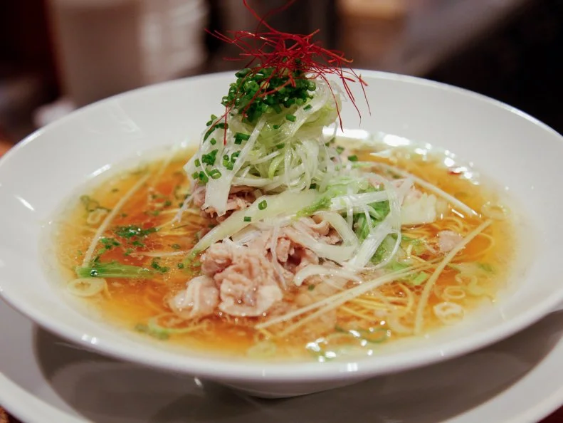 Ramen is an obsession in Tokyo, and Suzuran has been a favorite for it ever since it opened. In 2014 the shop moved from its original location to classier digs, refining the recipes to match the ambiance. The menu of limited-edition offerings brims with seasonal ingredients like asari clams with napa cabbage, but the classic shabu-shabu ramen — paper-thin slices of pork in an aromatic yuzu-tinged broth — never disappoints. All the noodles are homemade and come in a range of widths and textures.