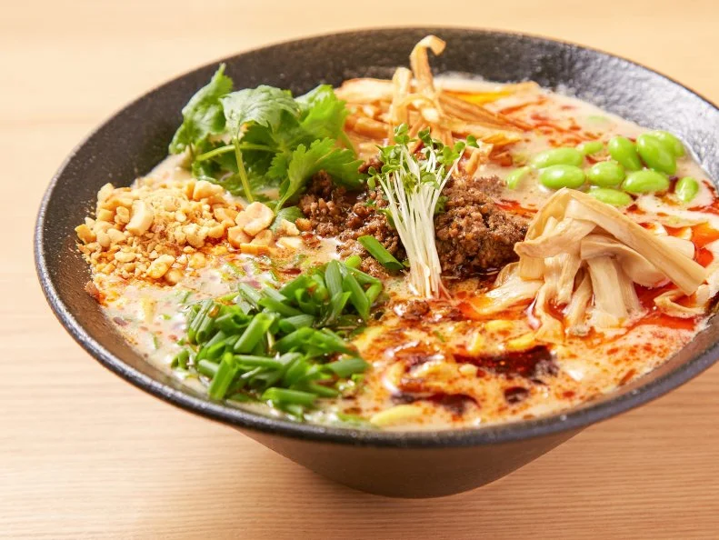 In a city teeming with thousands of ramen shops, Mensho Tokyo deserves props for the experimental creations of owner Tomoharu Shono, the mastermind behind a quintet of shops in Tokyo and, more recently, an outpost in San Francisco. Located just outside of Korakuen Station, the sleek space features a shiny glass-and-steel laboratory, where the chef tests his latest ideas. Mensho Tokyo is famous for its lamb tonkotsu soup, a rich and milky broth made with pork and mutton bones. The signature bowl comes with homemade noodles, slices of seasoned roast lamb and a squeeze of zesty sudachi citrus, for a crazy-sounding combination that works brilliantly.