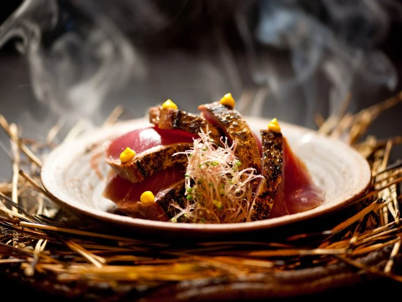 Pioneering chef Seiji Yamamoto revolutionized traditional kaiseki cuisine by introducing avant-garde techniques to the Japanese kitchen (he once famously used a CT scanner to examine the skeleton of a pike eel). In recent years, he has moved away from culinary pyrotechnics in favor of a more subdued approach, but the highly refined dishes at Ryugin prove that his three-Michelin-starred food is still as exceptional as ever. Yamamoto is dedicated to outstanding ingredients, and seafood is his wheelhouse. Delicate pomfret sashimi is dotted with Japanese chile paste and served alongside crisp fried fish bones. Simmered abalone and charcoal-grilled Japanese lobster sit atop a savory egg custard, luxuriating in a silky scallop sauce enriched with abalone liver.